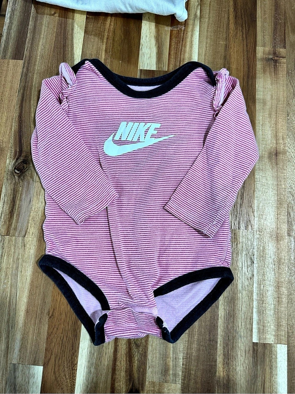 Nike Kids Striped Bodysuit in Pink 12M